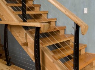 Two inch stair treads and timber stringers with cable rail
