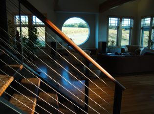 A view through the cable of the round window