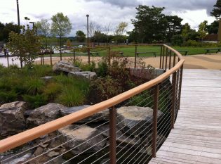 Boardwalk bridge leading through the gardens