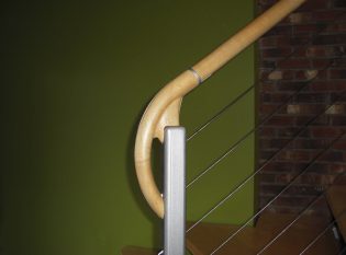 CNC machined newel post and hand rail detail