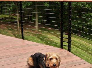 Composite decking with black steel cable railing posts