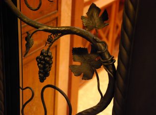 Hand forged grapes, leaves and vines