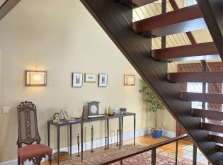 Formal hallway with floating stair