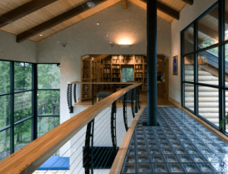 Glass block floor bridge with cable railing.