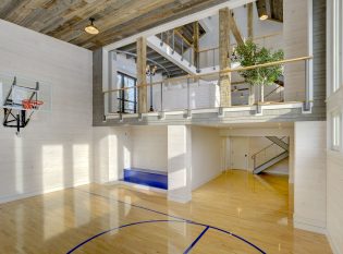 Indoor basketball court with open loft for viewing the game