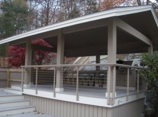 Keuka Cable Railing Around This Outdoor Kitchen Dining Area