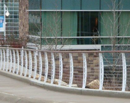 Custom made White Keuka Style cable railing and gate for Lakeland hospital.