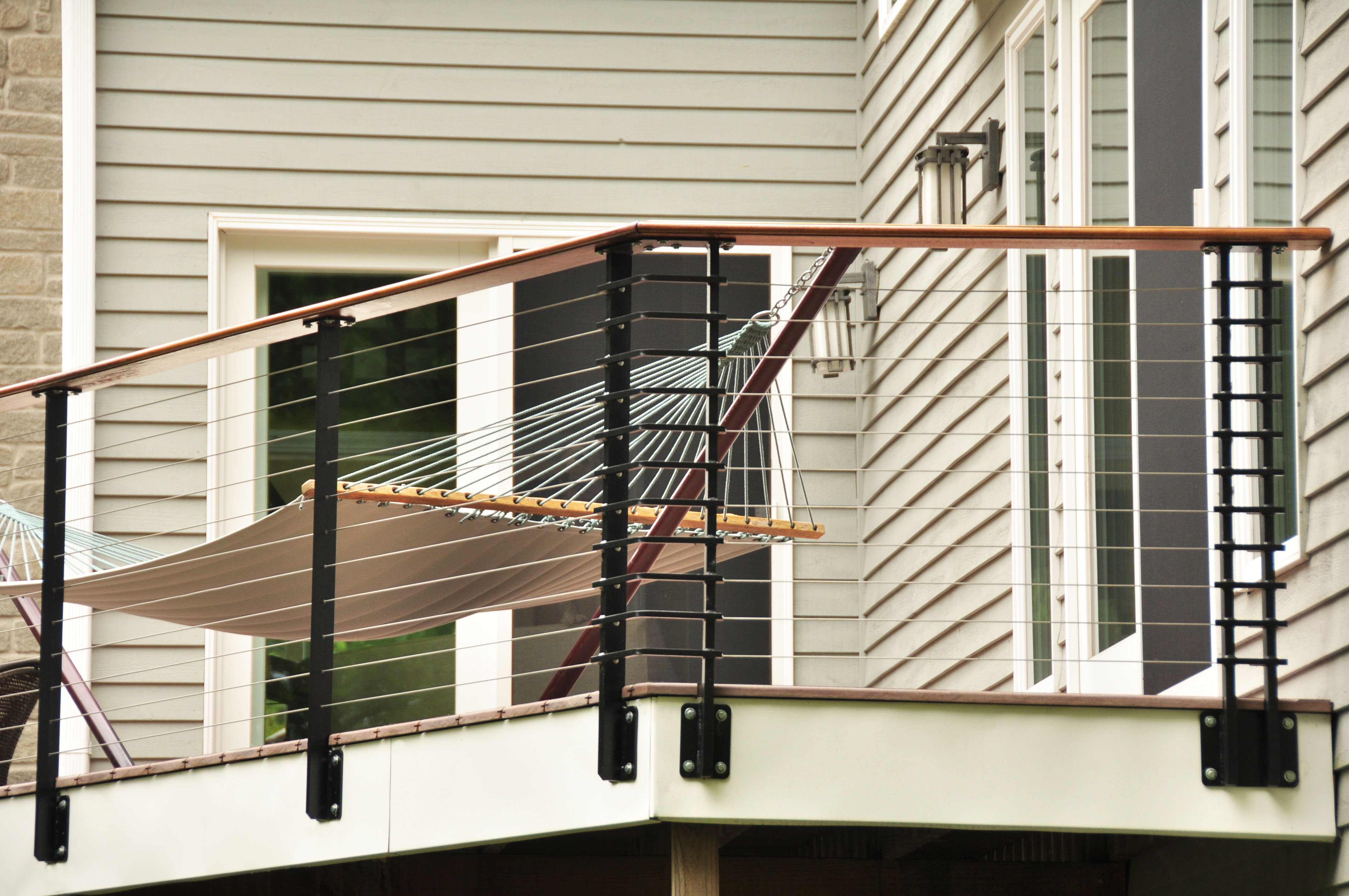 Modern cable railing system on deck