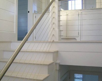 Cable railing and stainless steel hand rail.