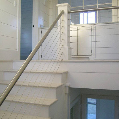 Cable railing and stainless steel hand rail.