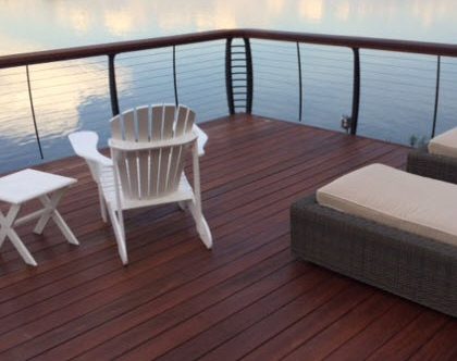 boathouse cable railing with curved posts on lake
