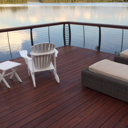 boathouse cable railing with curved posts on lake