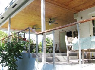 Outdoor deck with ceiling fans