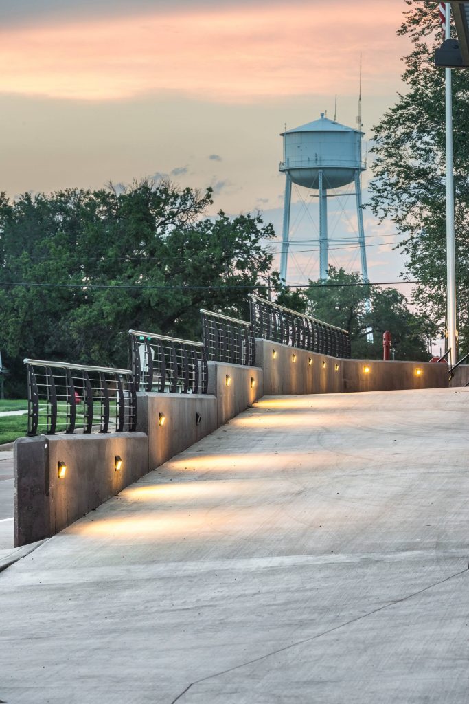 Stepped concrete wall with cable railing