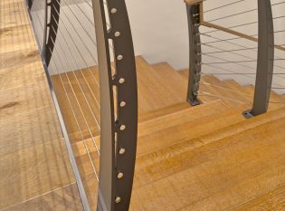 Reclaimed oak stairs with steel railing system