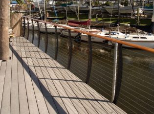 Sailboats and harbor cable railing views