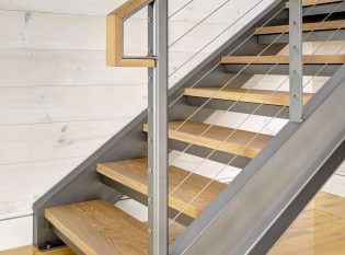 Steel channel stringers staircase with cable railing