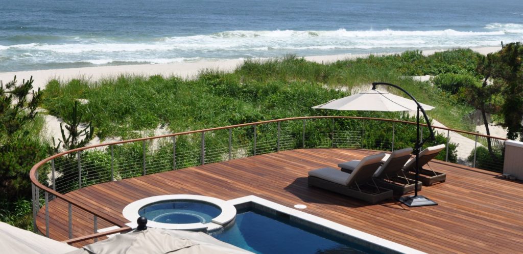 Pool deck railing overlooking the ocean on the Jersey shore.