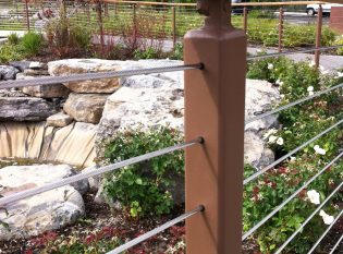 View of the rock garden through Keuka Studios cable railing