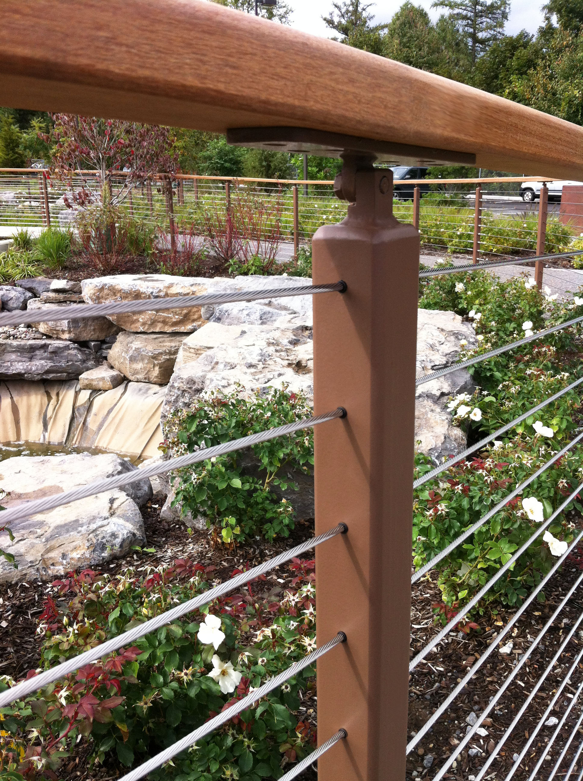 View of the rock garden through Keuka Studios cable railing