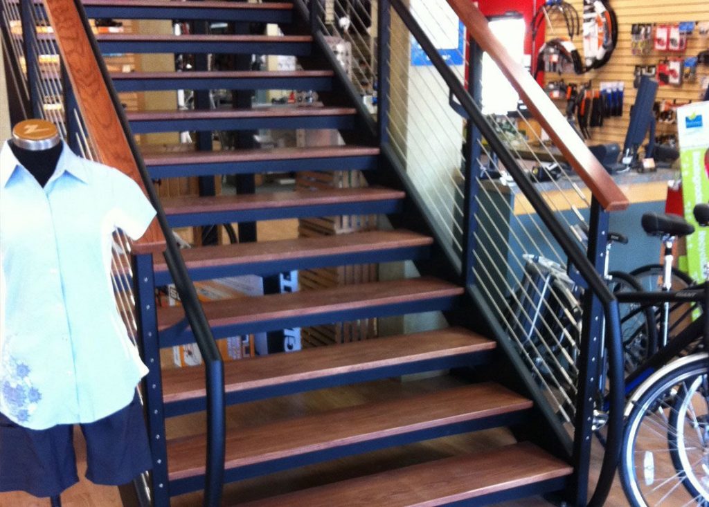 Wood Stair with Metal hand railing at Ithaca bike shop.