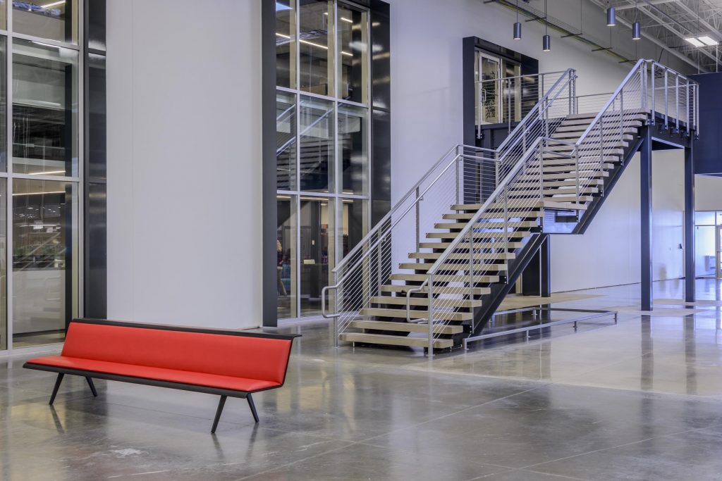 Manufacturing facility with Monumental Stair and cable railing.