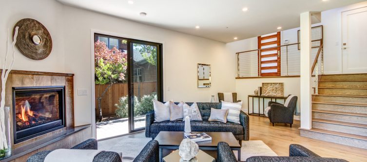 living room entry with stair and balcony cable railing