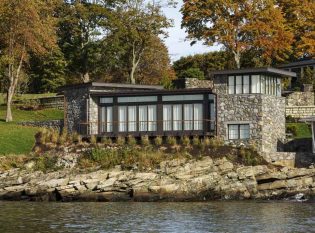 Stone home with steel and glass