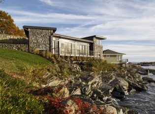 Cliff Side Stone Home with Keuka cable railing