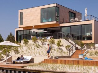 Modern Home on the Jersey Shore with Terraced decks and Ithaca Style cable railings 