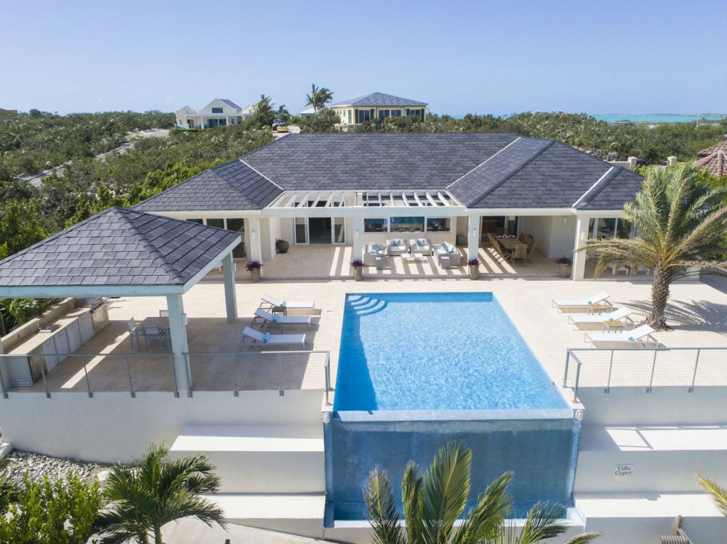 Infinity edge pool with Keuka studios Ithaca style railing on a beautiful villa in the Turks and 0caicos.