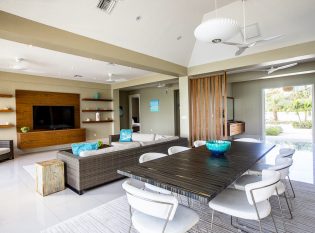 Open concept indoor space with beach style.