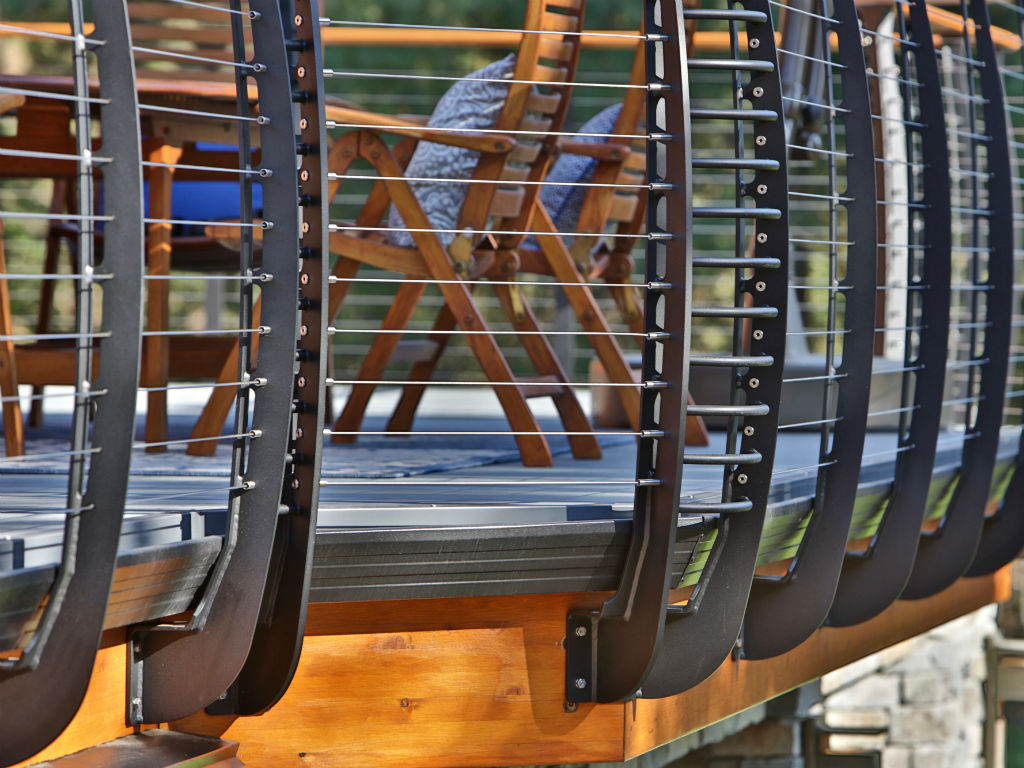 Custom made curved deck railing fascia mounted 