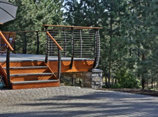 Curved railing on deck stairs