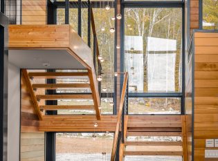 Wood Staircase with black cable rails