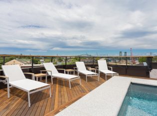 Roof top deck with curved cable railing