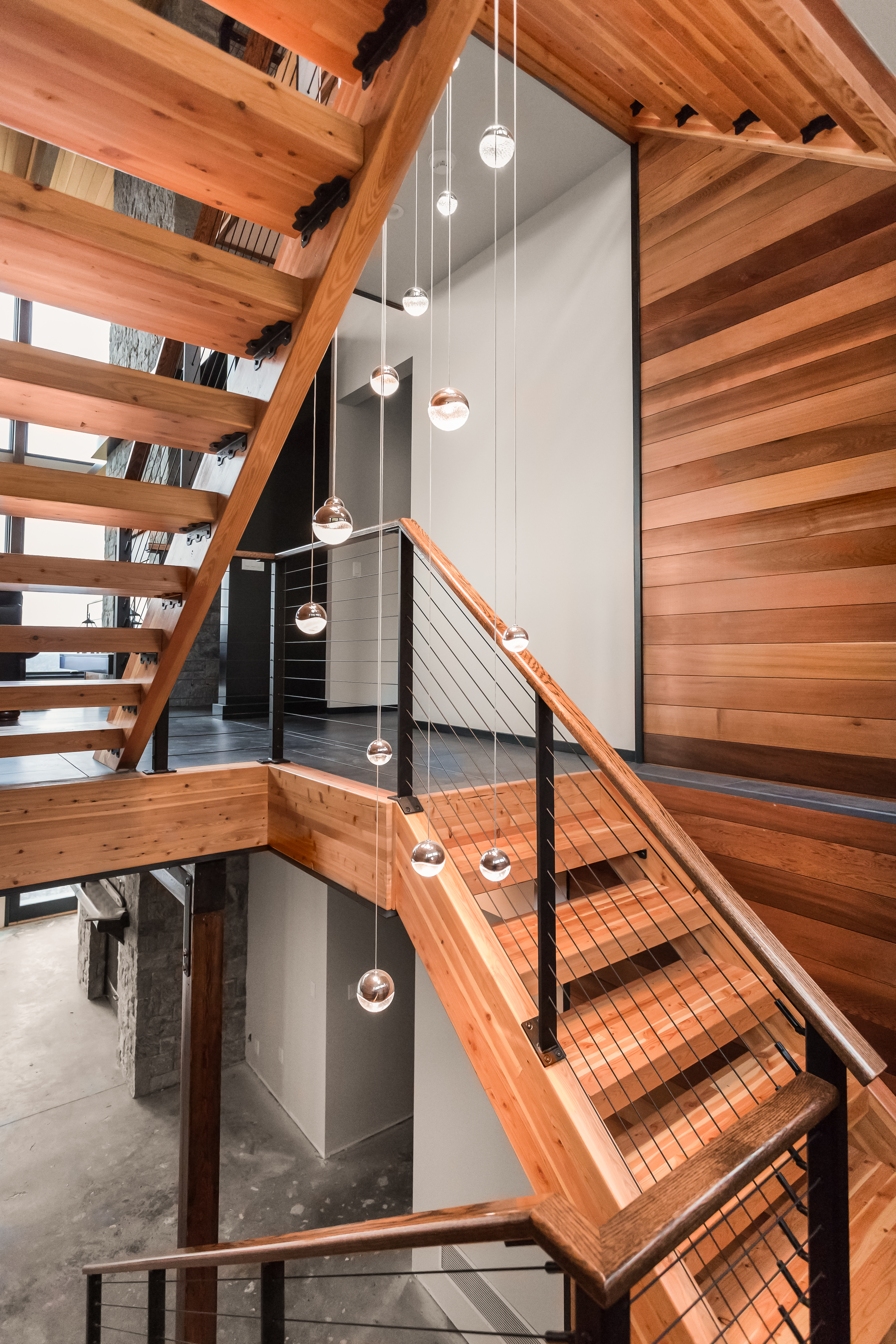 Wood Staircase with black railing