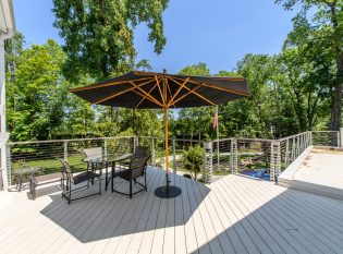 Outdoor dining with Keuka Studios Chicago style railing