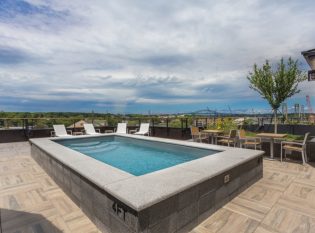 Pool deck with view of Portsmouth