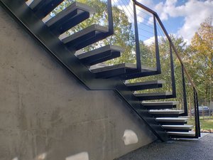 Cantilevered stairs by Keuka Studios