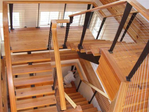 Custom staircase and railing in traditional Nantucket home