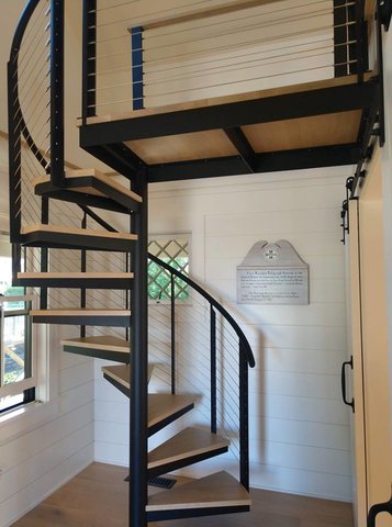 Custom spiral staircase with cable railing