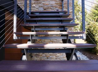 Floating staircase with composite lumber treads