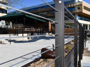 Close-up shot of Washington D.C. restaurant cable railing system.