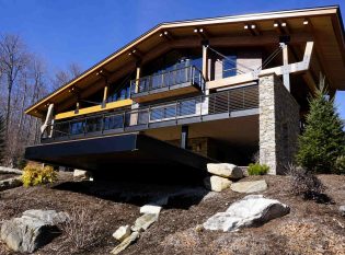 Vermont timber frame home with cable railing system