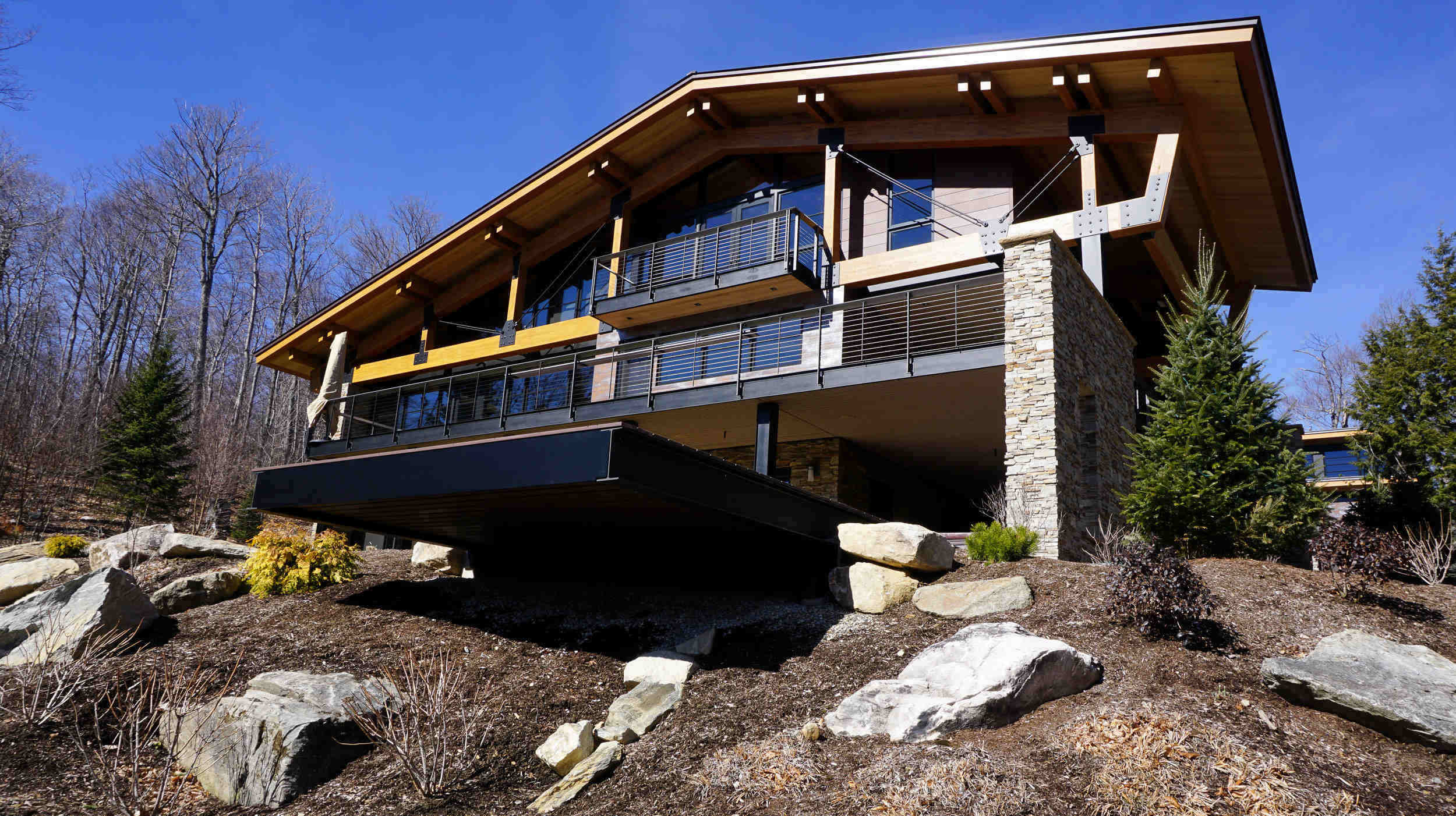 Vermont timber frame home with cable railing system