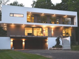 Exterior balcony, staircase, and deck with Ithaca Style cable railing.