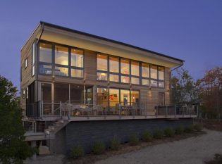 Modern Long Island home with exterior cable railing system. 
