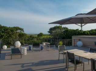 Outdoor living space on rooftop deck. 