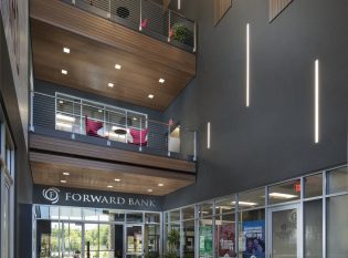 Bank interior atrium with cable railing.